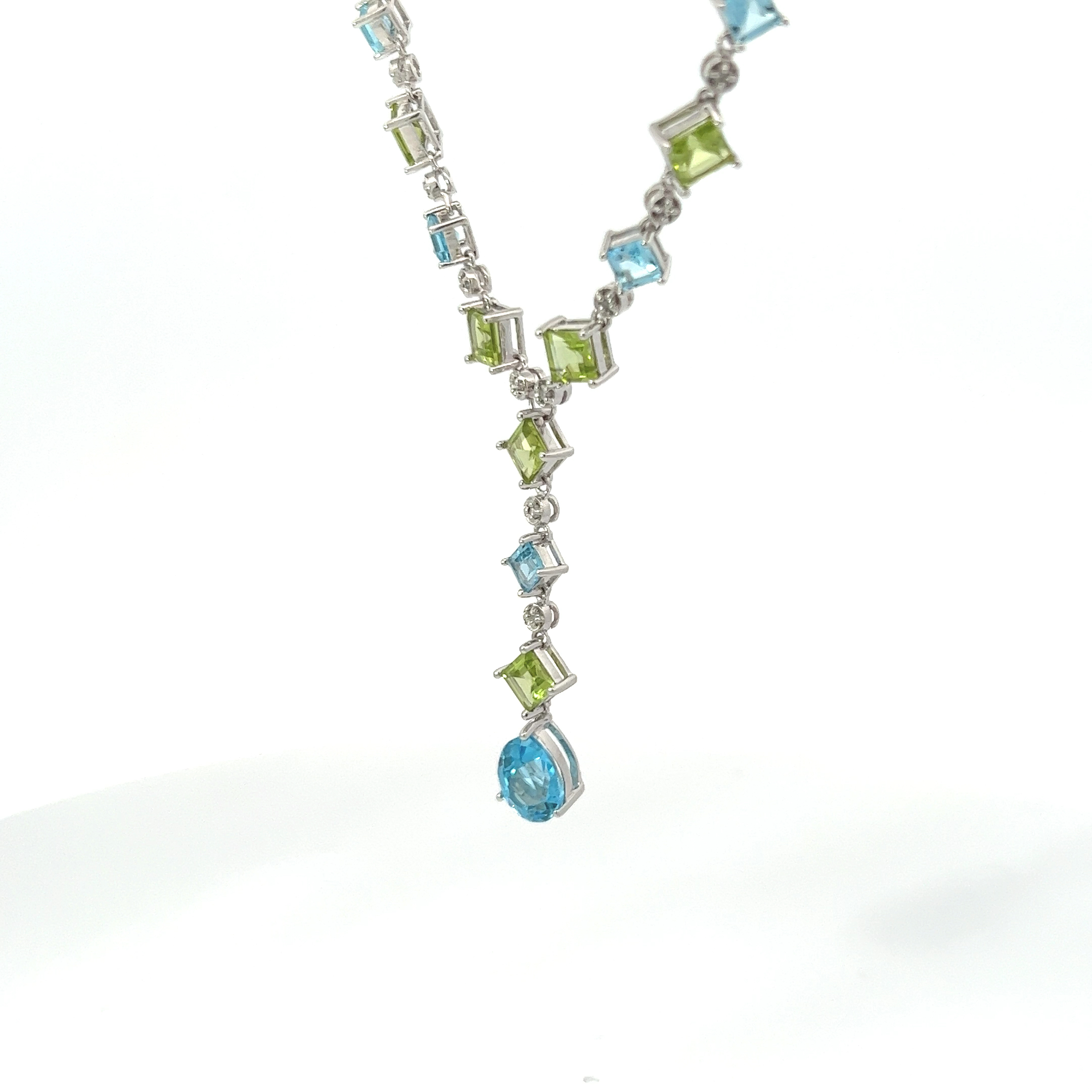 14K white gold, Diamond, Peridot, and Blue Topaz necklace